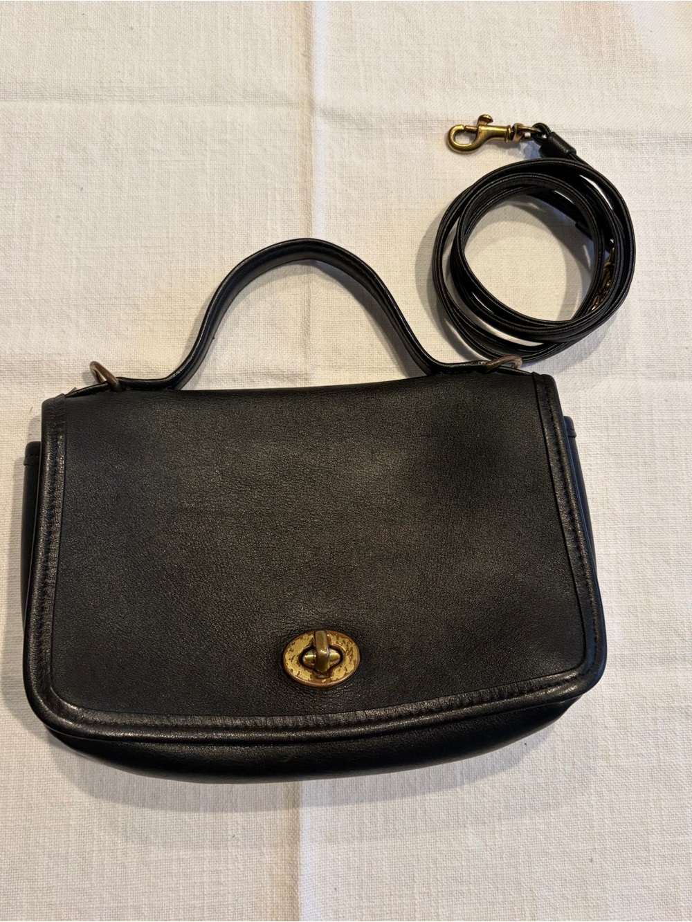 Classic Black Leather Top-Handle Crossbody Bag with Brass Turnlock